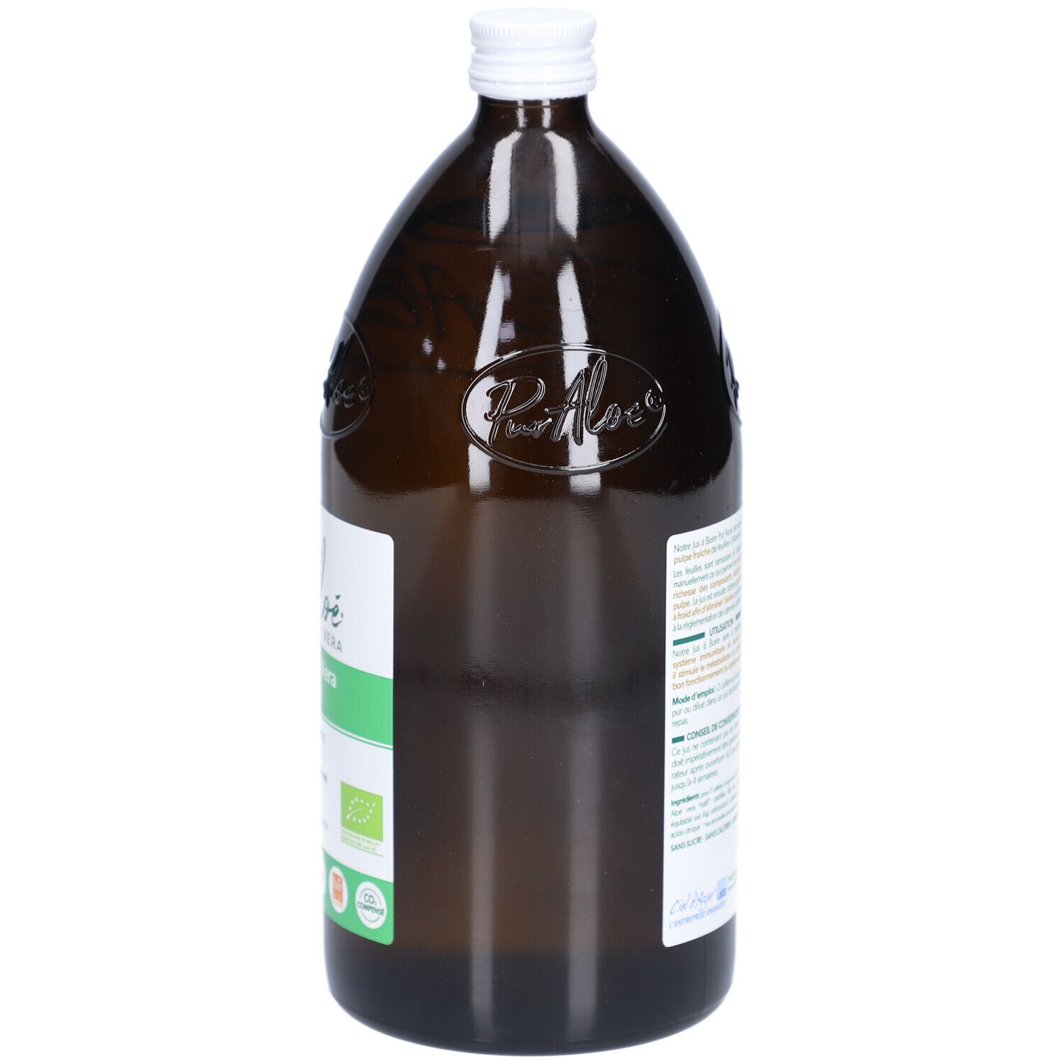 Bouteille en verre brun avec bouchon blanc. Étiquette avec texte. Vue de côté.