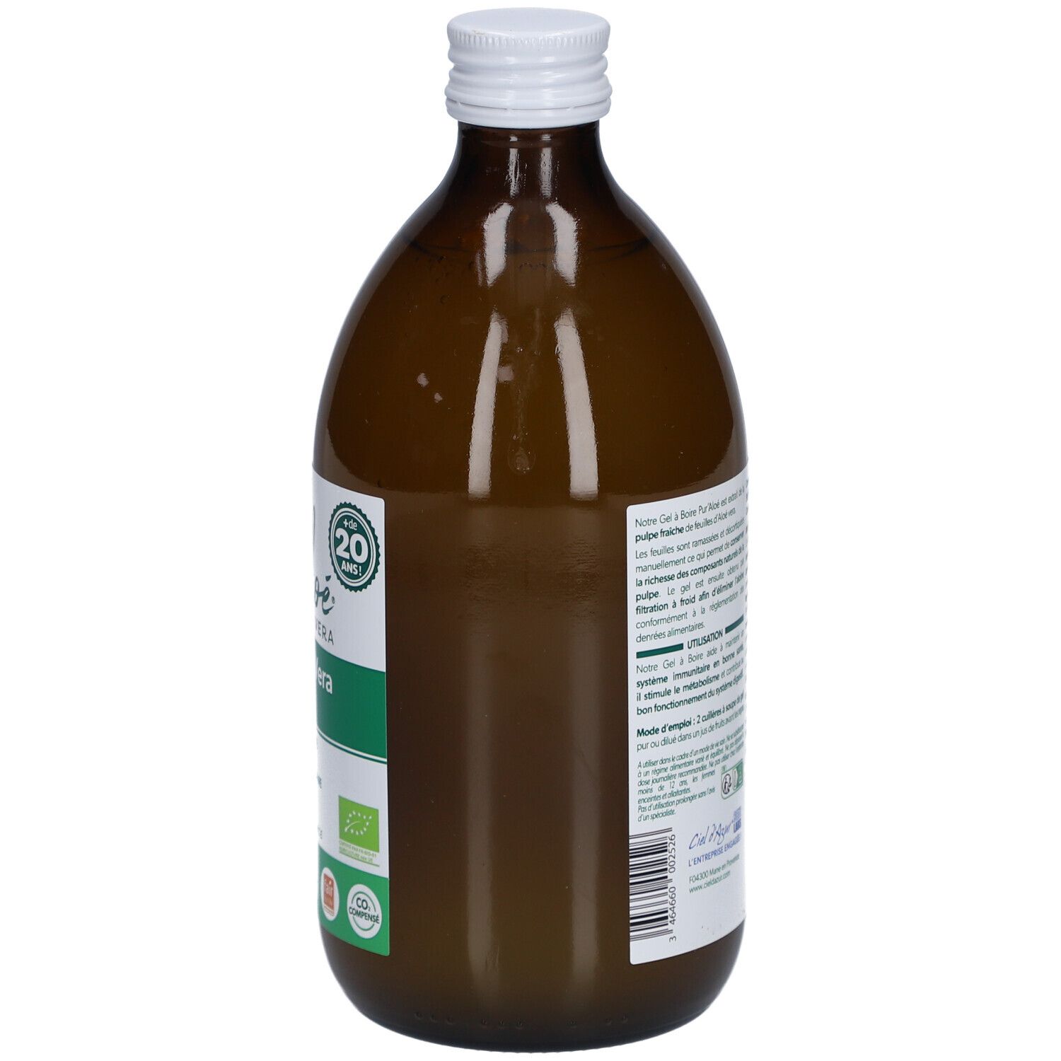 Bouteille en verre brun, bouchon blanc. Étiquette avec texte. Vue arrière du produit.