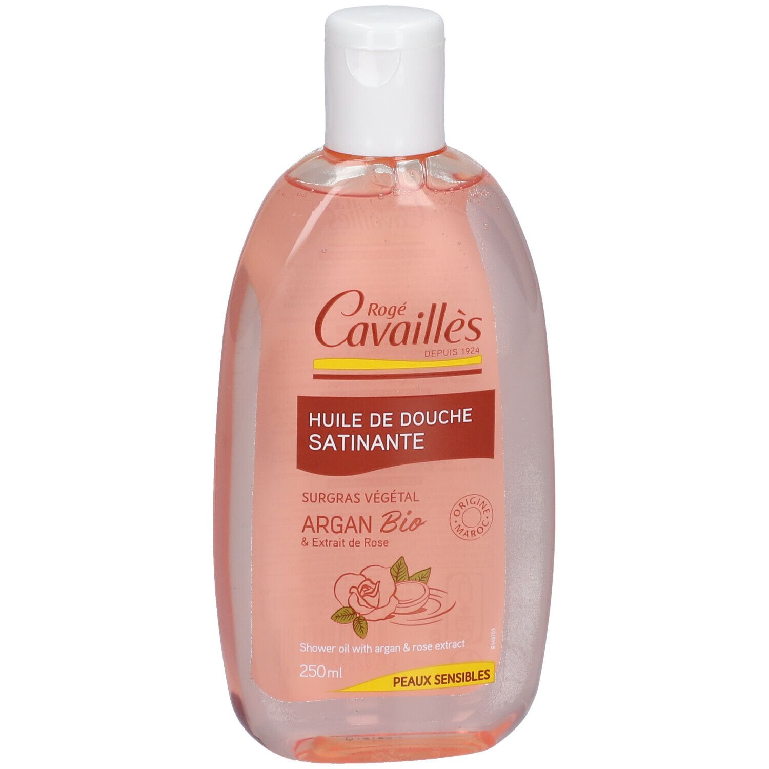 Flacon transparent, liquide rose. Bouchon blanc. Inscription: Rogé Cavaillès, Huile de Douche Satinante, Argan Bio.