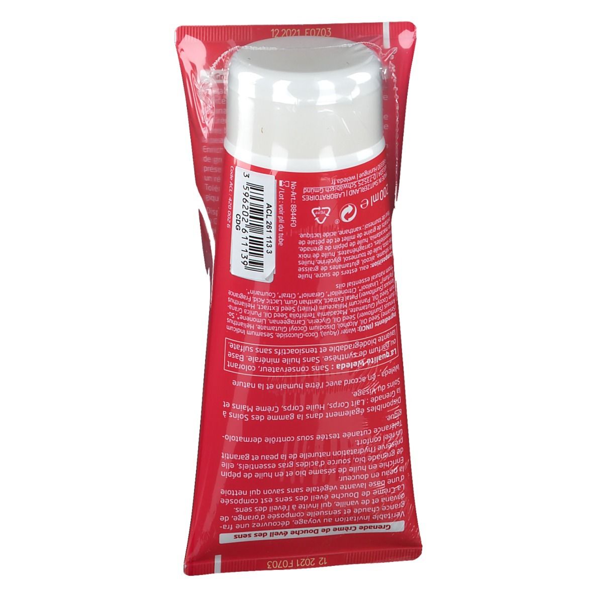 Tube rouge dans un emballage plastique. Bouchon blanc. Informations produit et code-barres imprimés. Emballage rouge.