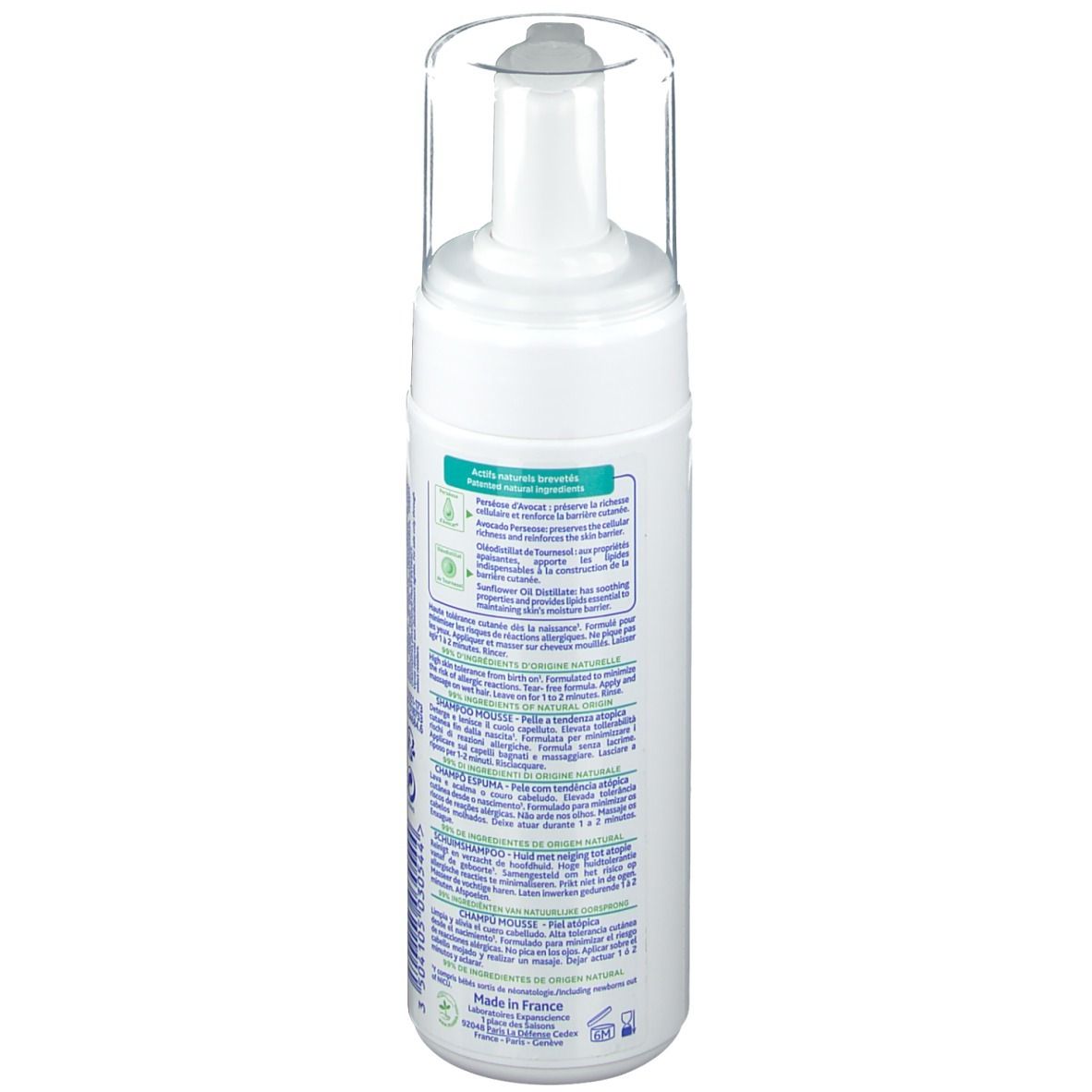 Dos d'un flacon de shampooing moussant Mustela Stelatopia blanc. Texte multilingue, dont informations sur les ingrédients.