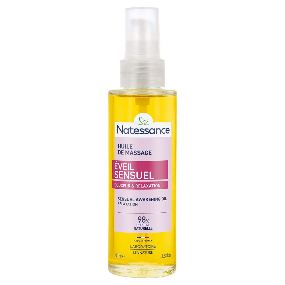 Flacon d'huile pour le corps avec vaporisateur. Étiquette avec nom et logo du produit. 98% ingrédients naturels.