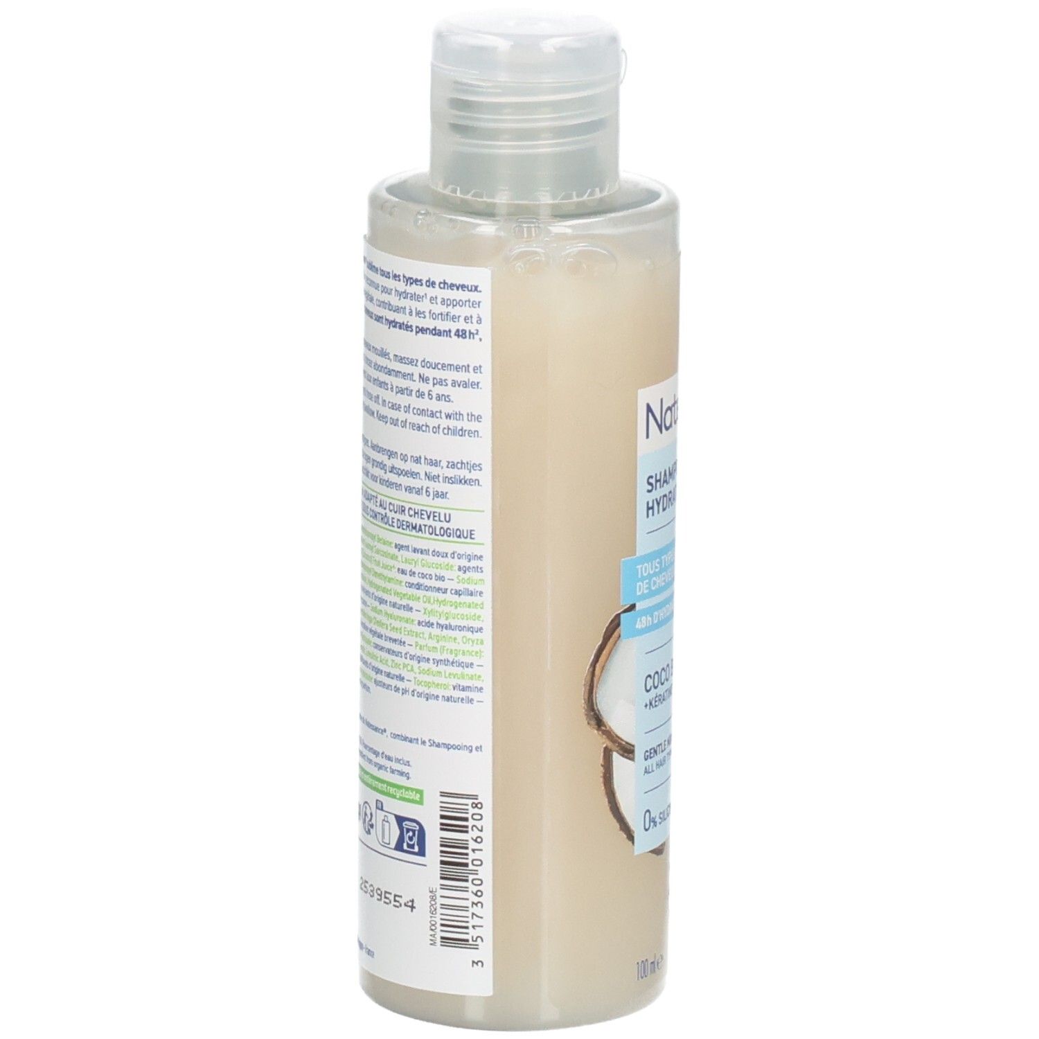 Dos du flacon de shampooing. Texte: informations sur le produit, ingrédients, fabricant. Logos et certifications.