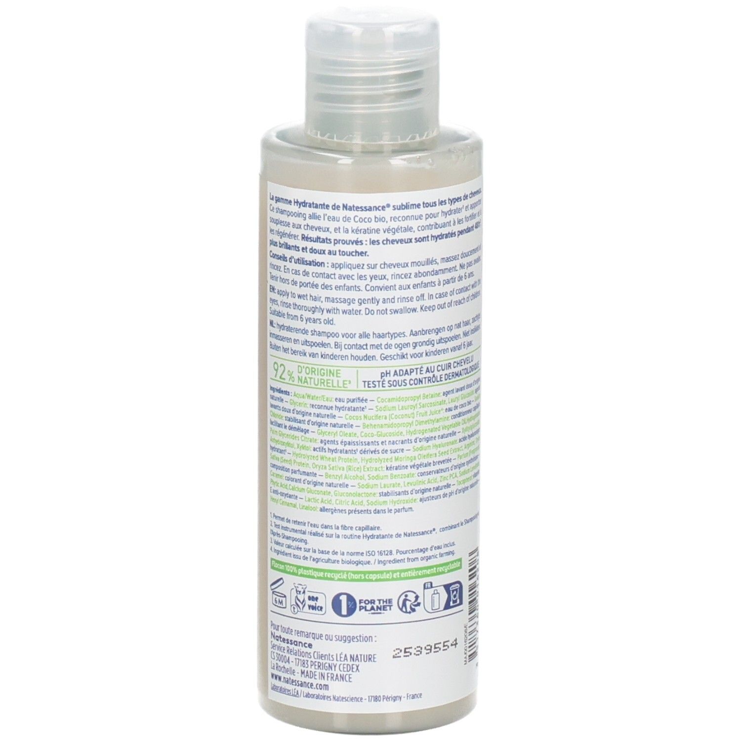 Dos du flacon de shampooing. Texte: instructions d'utilisation, ingrédients, fabricant. Logos et certifications.