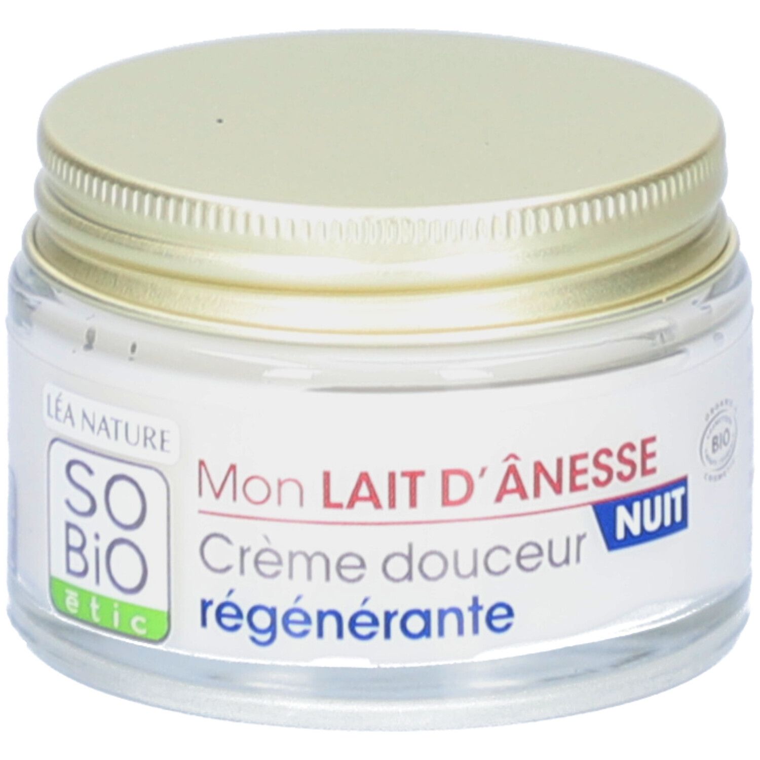 Crème en pot de verre avec couvercle doré. Inscription: SO'BiO étic, Mon Lait d'Ânesse, Crème douceur régénérante, Nuit.