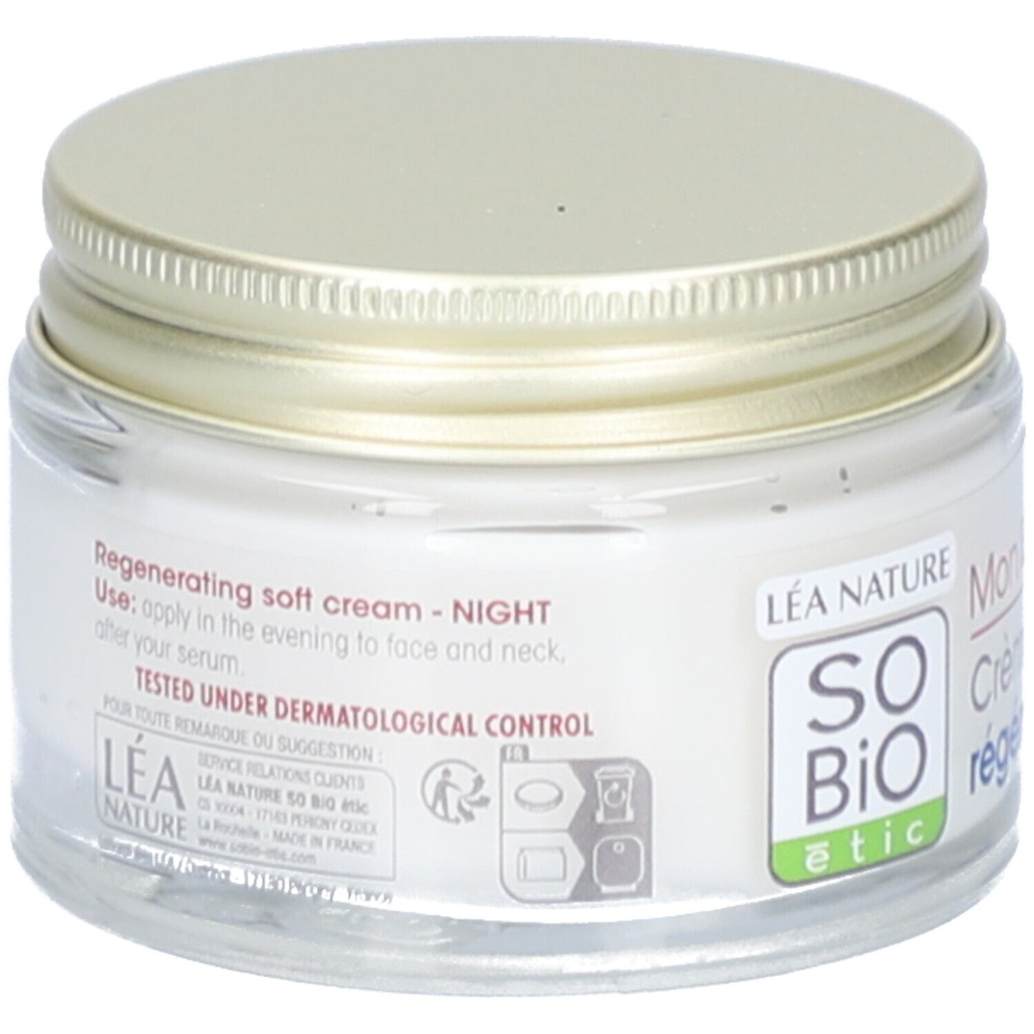 Crème en pot de verre avec couvercle doré. Inscription: SO'BiO étic, Mon Lait d'Ânesse, Crème douceur régénérante, Nuit. Texte: Regenerating soft cream - NIGHT.