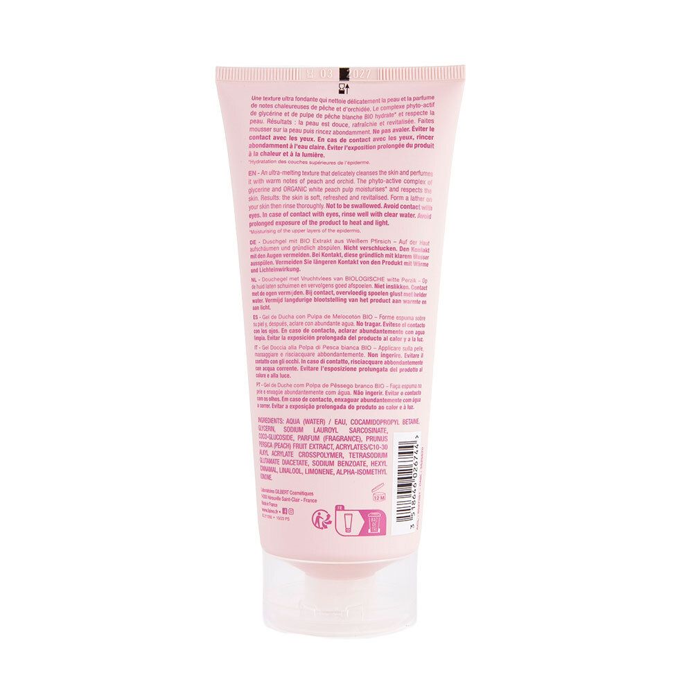 Dos d'un tube rose avec informations produit et ingrédients. Bouchon transparent.