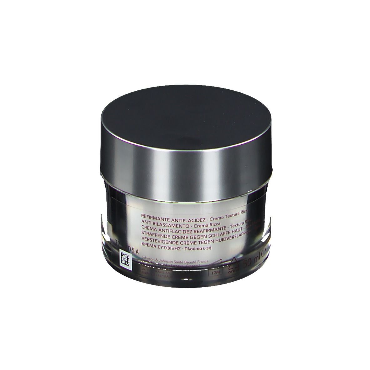 Pot de crème avec couvercle argenté. Différents textes en plusieurs langues sont visibles sur l'étiquette.