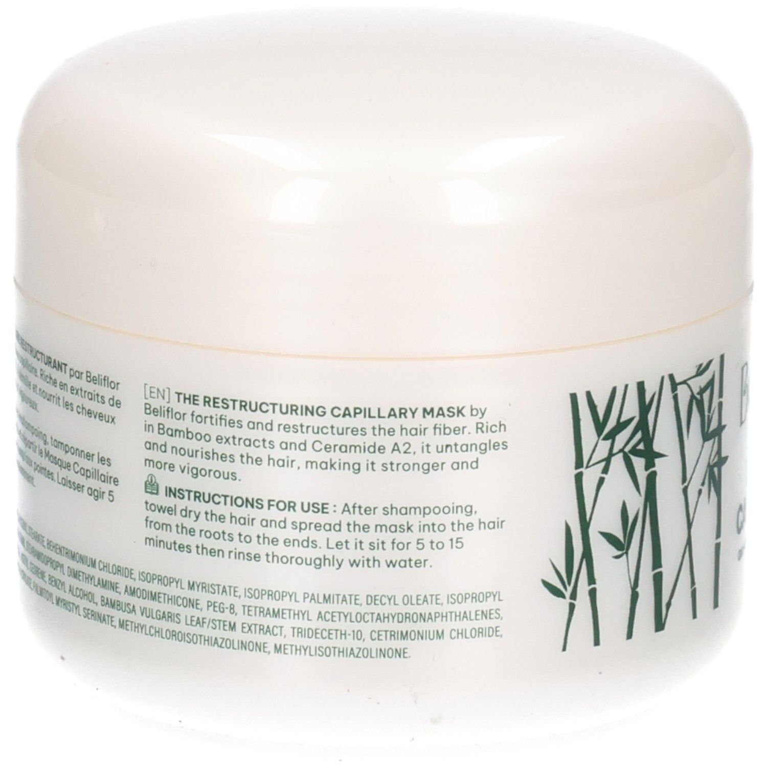 Arrière d'un pot blanc de masque capillaire avec instructions et ingrédients.