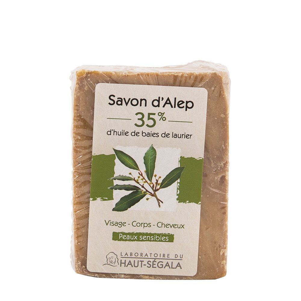 Savon d'Alep 35% emballé. Étiquette: Peaux sensibles, visage, corps, cheveux. Logo Laboratoire du Haut-Ségala. Emballage transparent.
