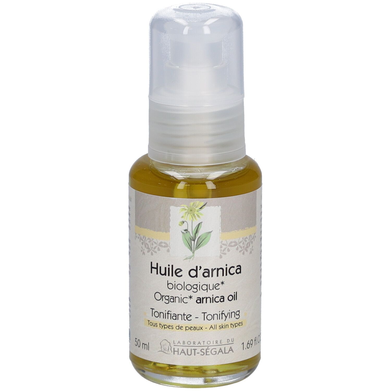Flacon d'huile d'arnica. Huile jaune dans un flacon en verre avec vaporisateur. Informations sur l'étiquette.