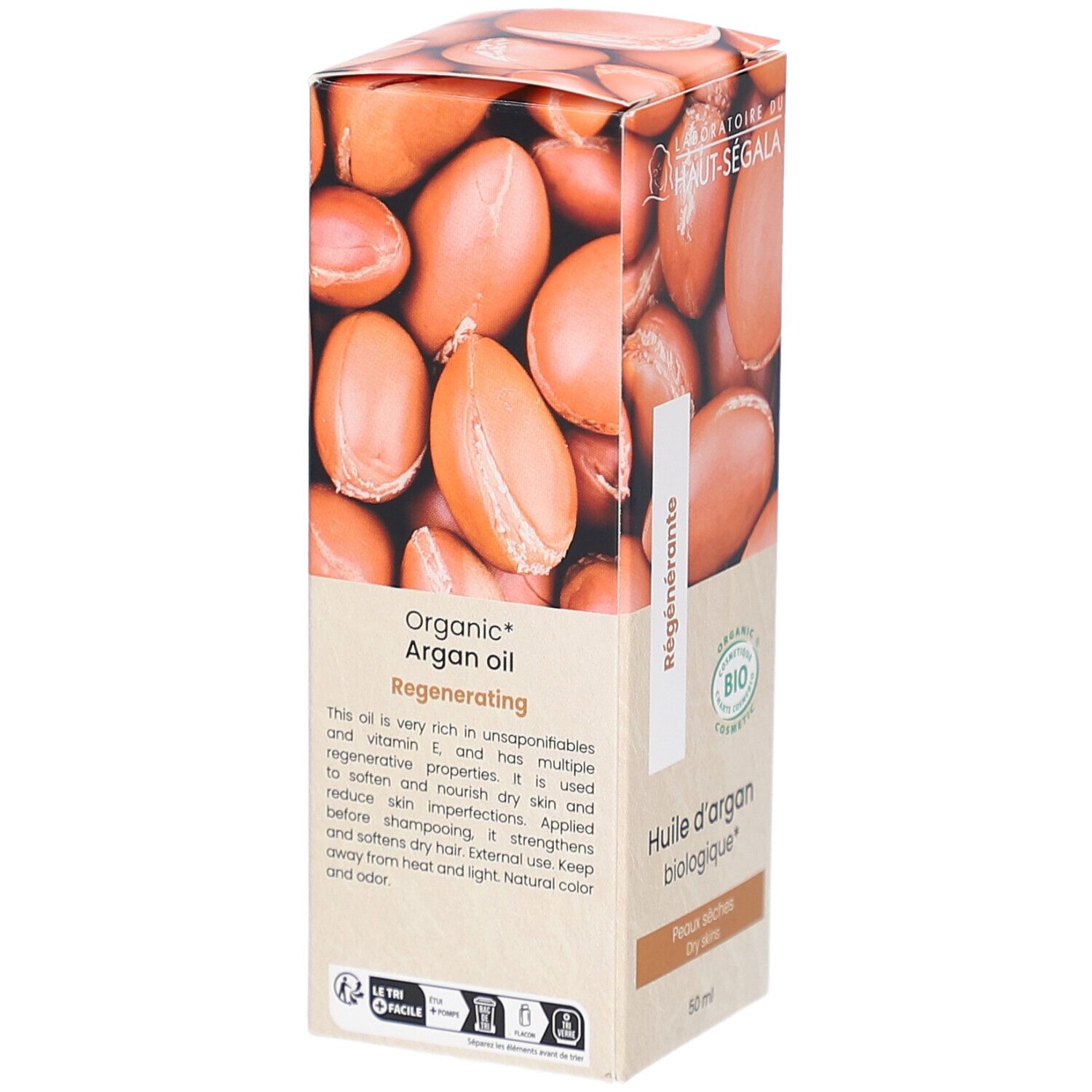 Boîte en carton avec illustration d'huile d'argan. Texte: Organic Argan oil, Regenerating. Label bio. Description du produit.
