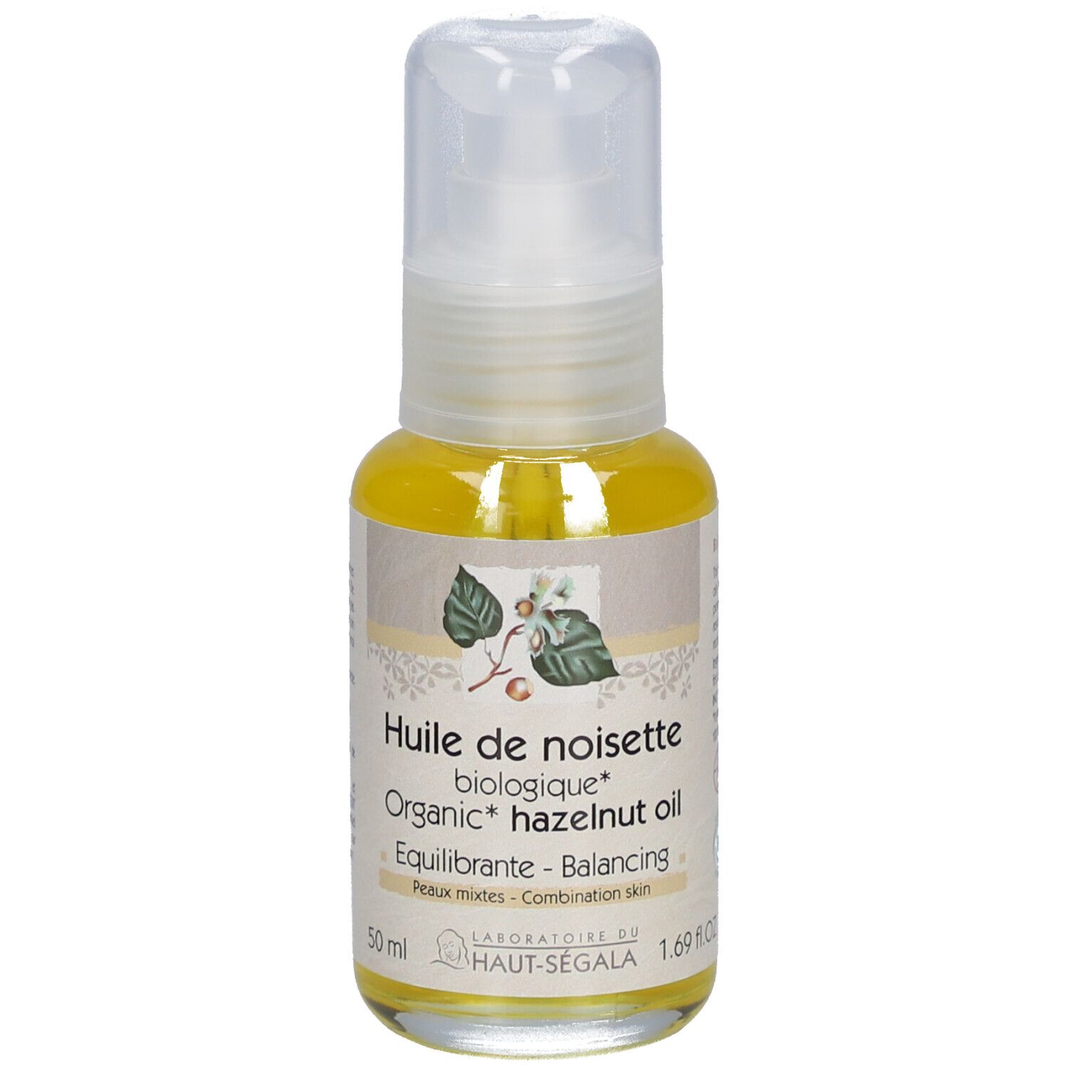 Flacon d'huile transparente avec pompe. Inscription: Huile de noisette biologique, 50 ml.