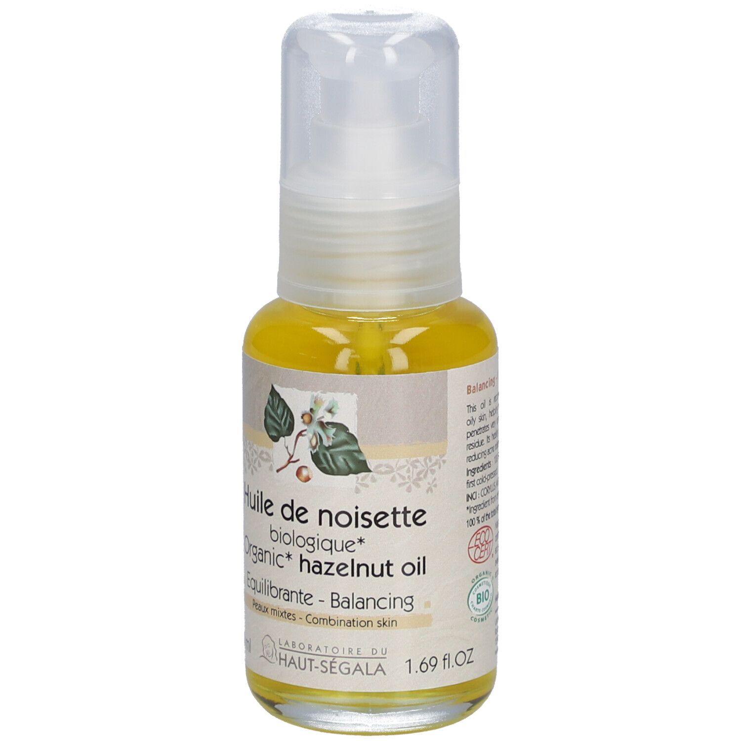 Flacon d'huile transparente avec pompe. Inscription: Huile de noisette biologique, 50 ml.