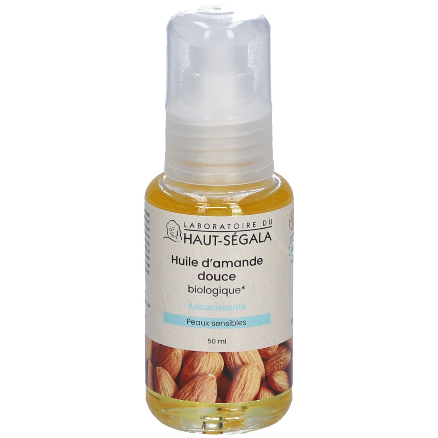 Flacon d'huile avec pompe. Inscription: Huile d'amande douce biologique, Adoucissante, Peaux sensibles. Amande.