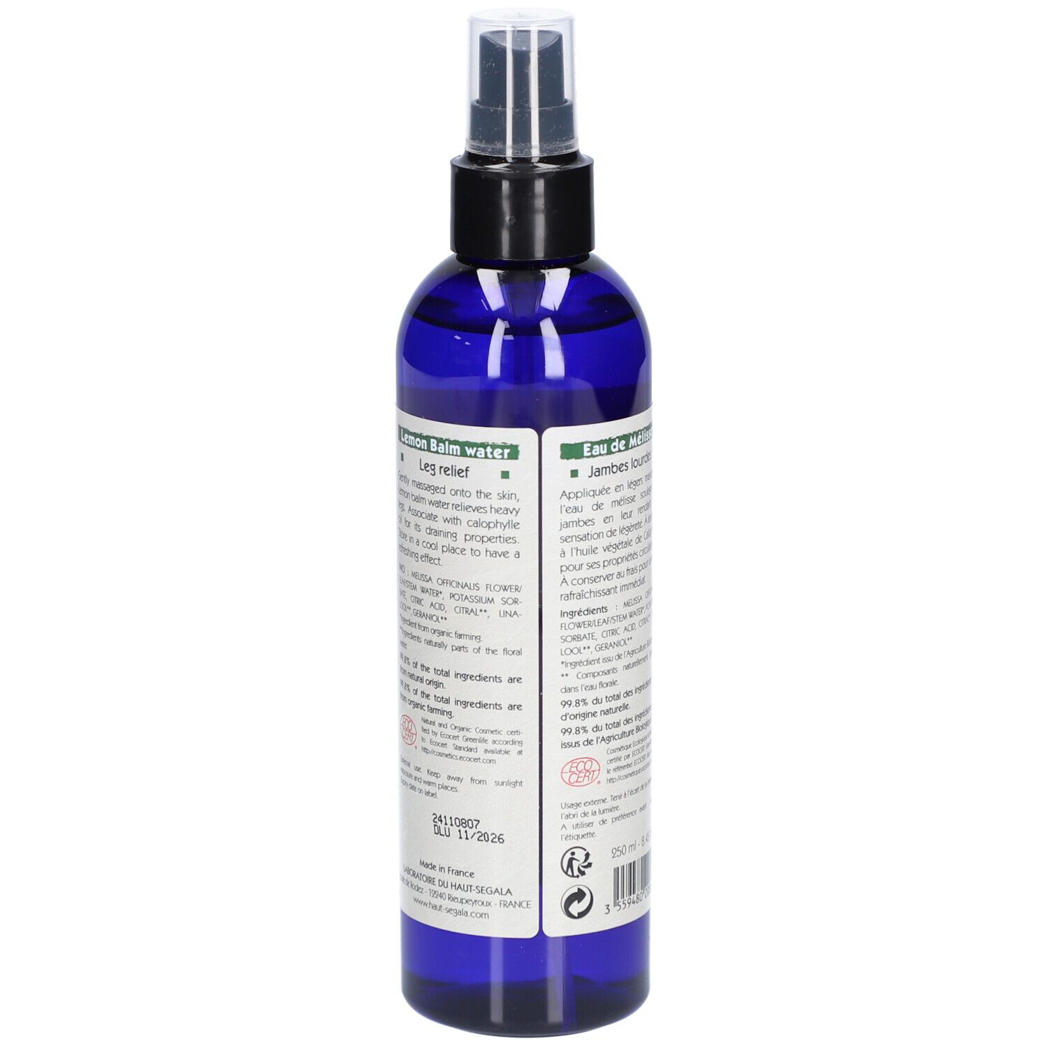 Flacon pulvérisateur bleu avec étiquette. Inscription: Eau florale Mélisse, Lemon Balm water. Certification Bio.