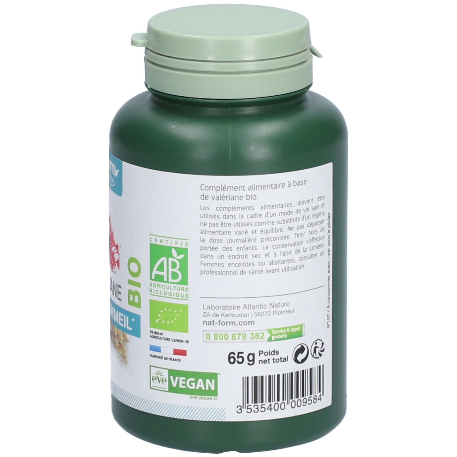 Dos d'un flacon vert. Étiquette avec informations, label BIO, logo Vegan et adresse fabricant. 65g.