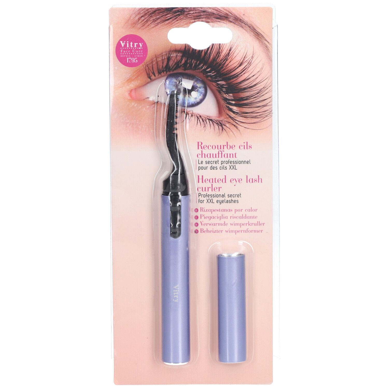 Recourbe-cils chauffant. Boîtier violet, partie noire. Emballage avec illustration d'œil. Marque Vitry.