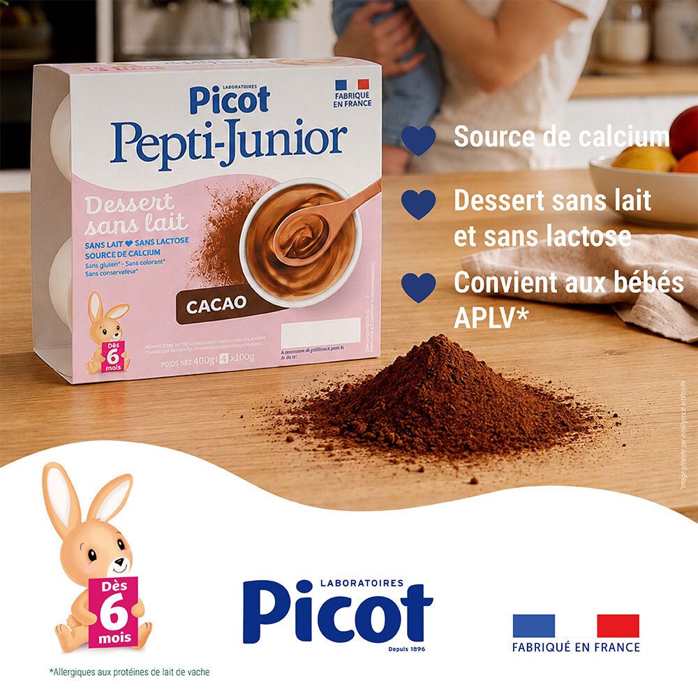 Picot Pepti-Junior dessert cacao sur table en bois, avec poudre de cacao et cuillère.