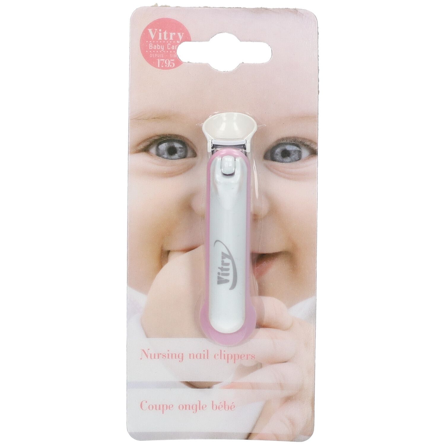 Coupe-ongles bébé rose et blanc sur emballage. Marque Vitry. Texte: « Nursing nail clippers ».