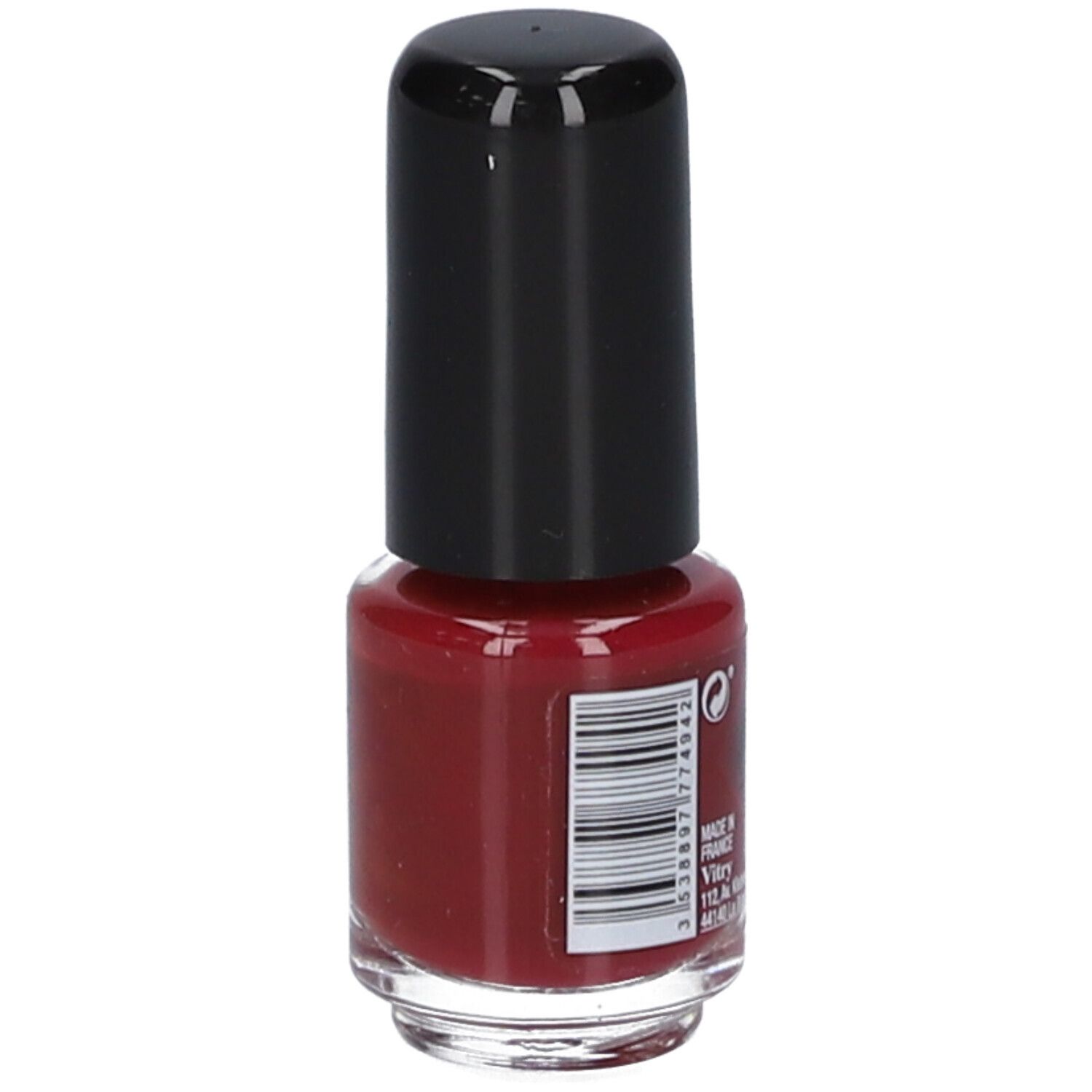 Dos d'un flacon de vernis à ongles. Bouchon noir. Code-barres et informations. Liquide rouge visible.