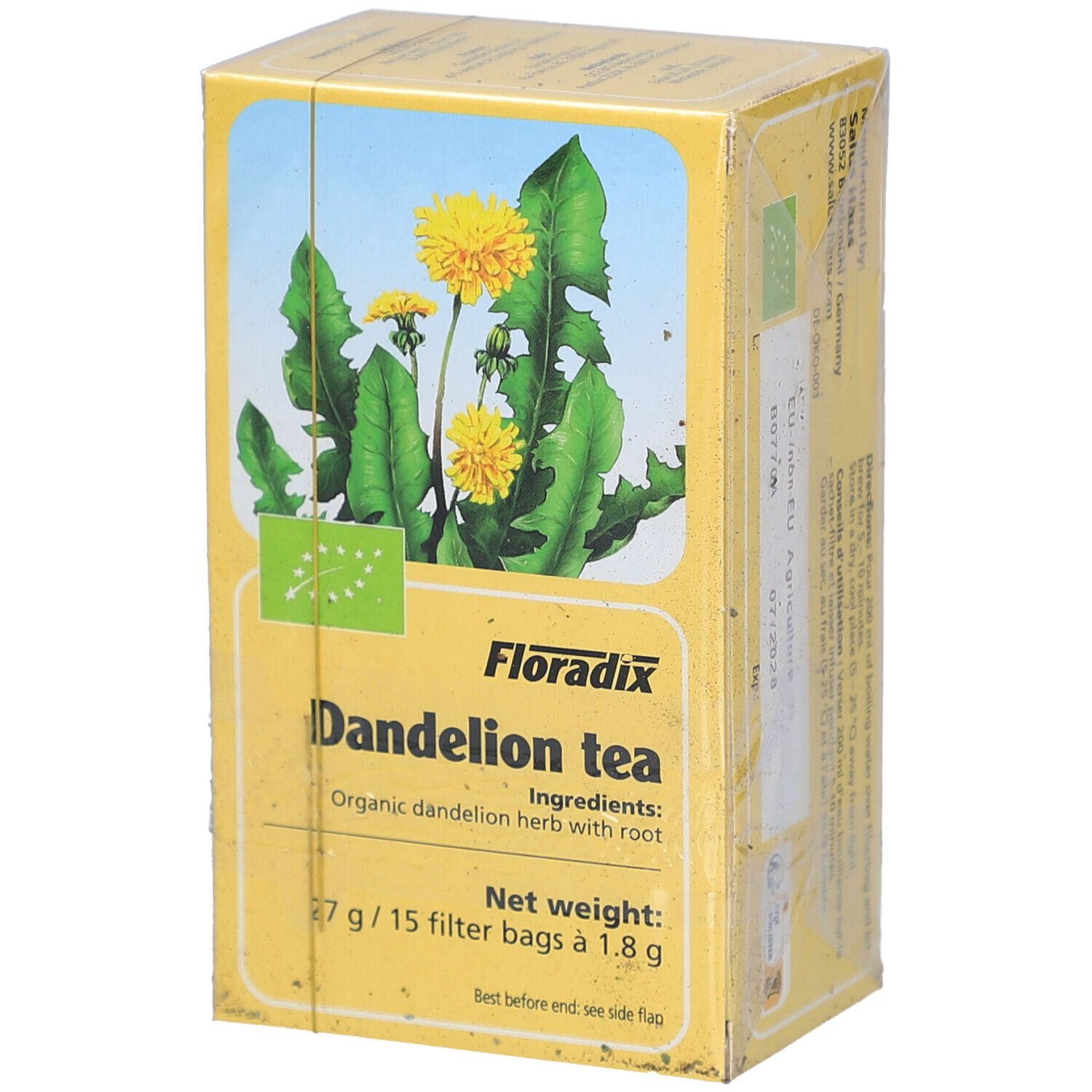Boîte jaune avec motif floral et texte. Contient "Dandelion tea". Label bio visible. 27g/15 sachets filtre.