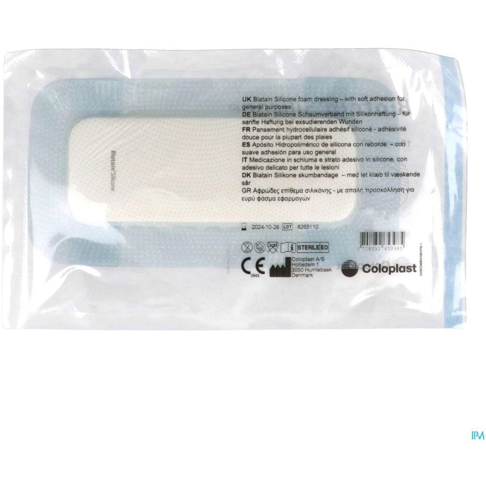 Pansement en sachet. Nom du produit et dimensions visibles. Marquage CE et informations du fabricant.