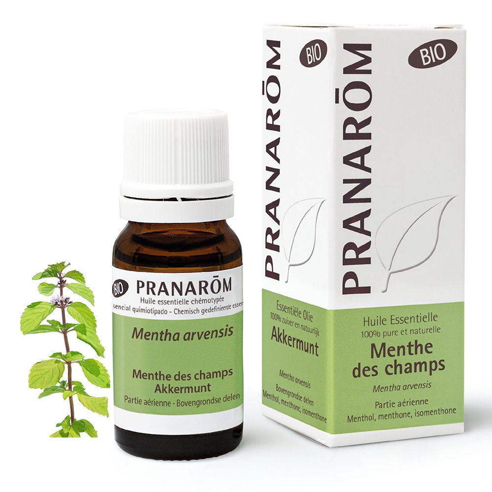 Flacon en verre brun avec bouchon blanc et étiquette. Boîte avec informations produit et label bio.
