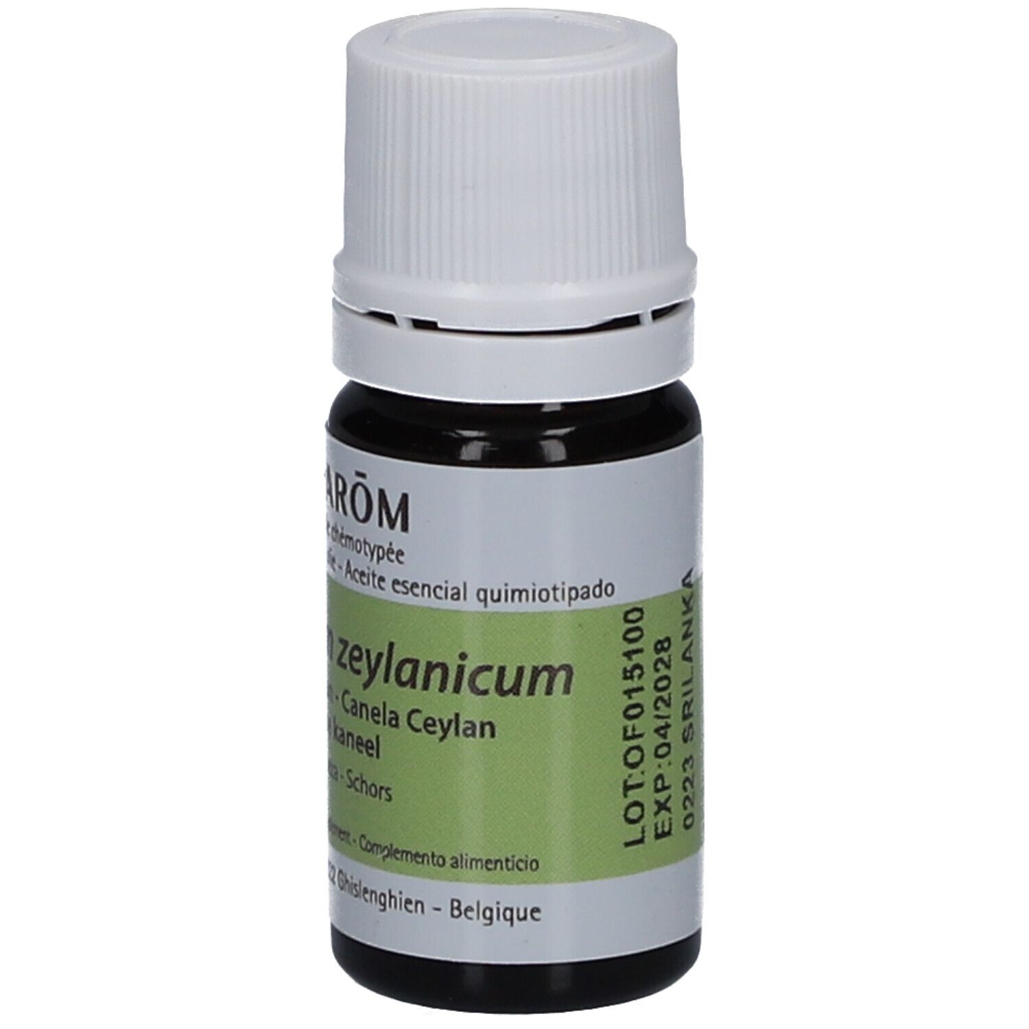 Flacon en verre brun avec bouchon blanc. Étiquette avec texte: Cinnamomum zeylanicum, 5 ml. Label AB.