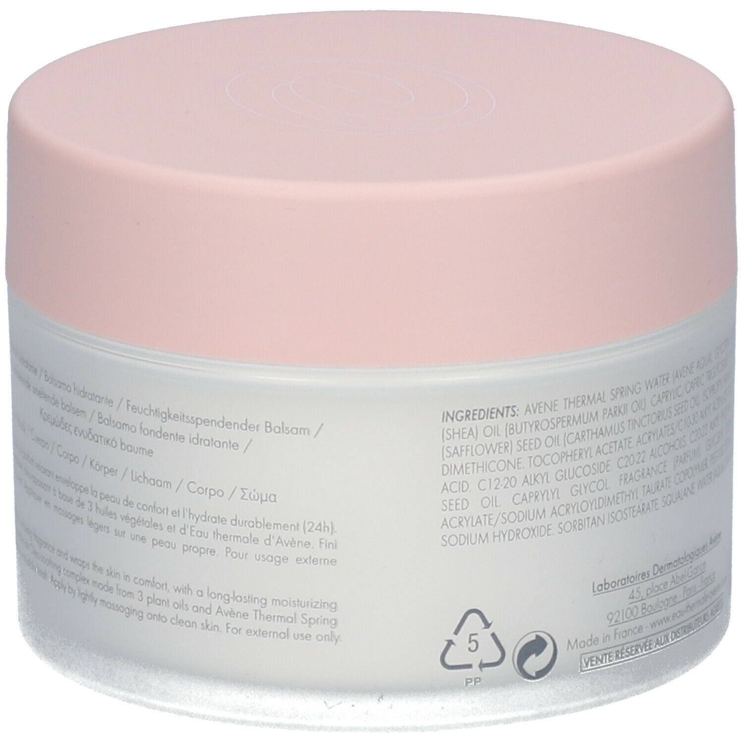 Pot de crème vu d'en bas. Couvercle rose, ingrédients et informations du fabricant visibles.