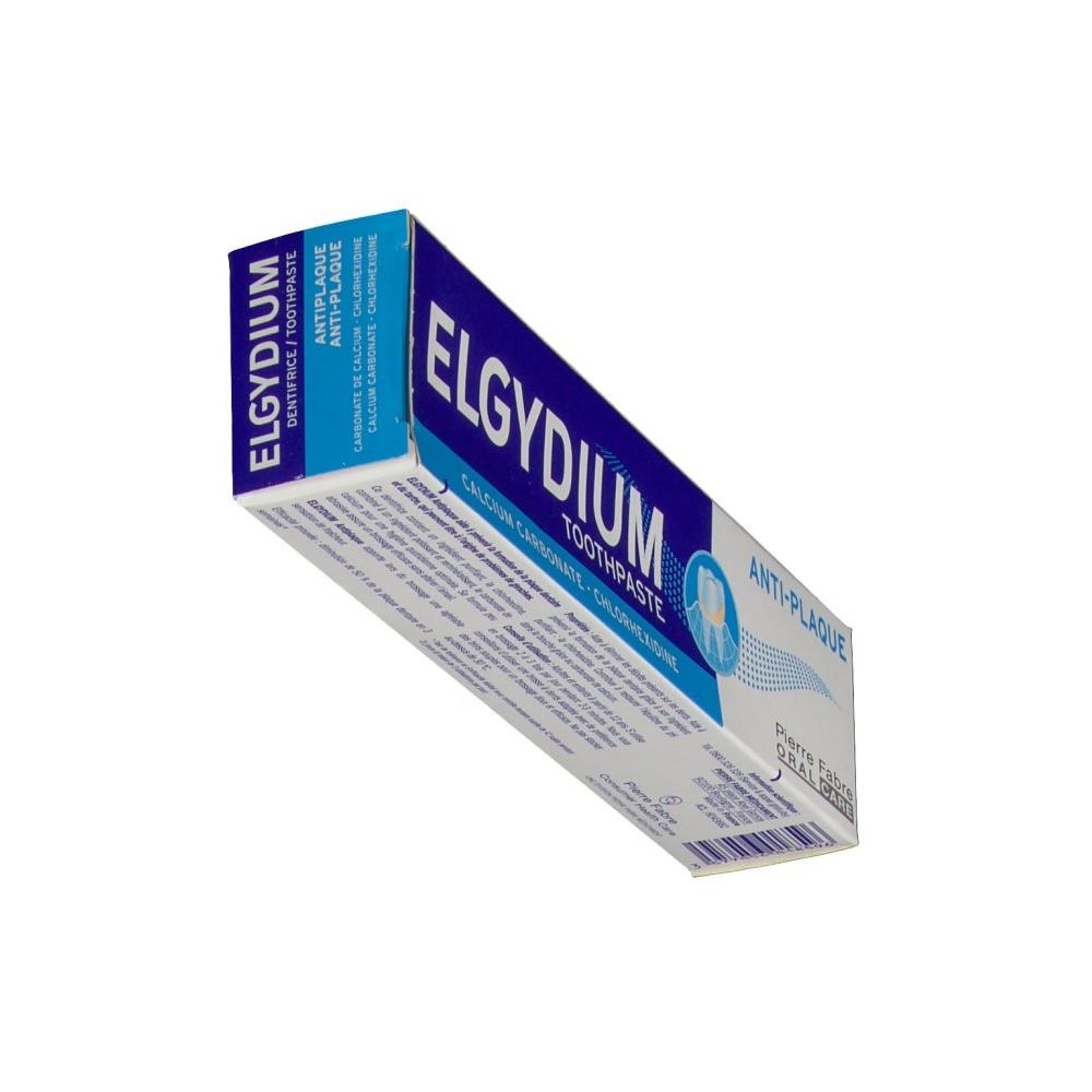 Boîte de dentifrice blanche et bleue. Inscription: ELGYDIUM TOOTHPASTE, Anti-Plaque, Pierre Fabre Oral Care. Contient carbonate de calcium et chlorhexidine. Vue perspective.