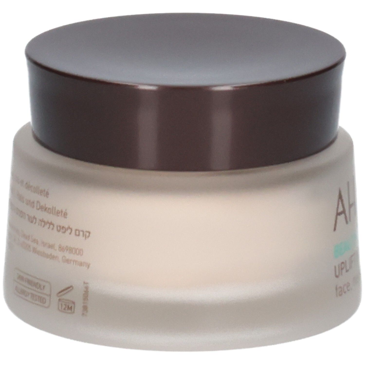 Pot de crème avec couvercle marron. Inscription AHAVA, BEAUTY BEFORE AGE, UPLIFT NIGHT CREAM, face, neck and décolleté.