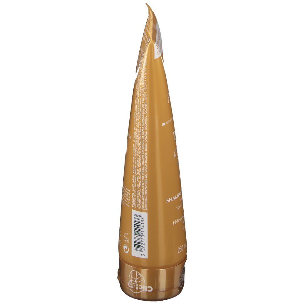 Tube doré, vue latérale. Texte: Shampooing sublimateur, 250 ml.