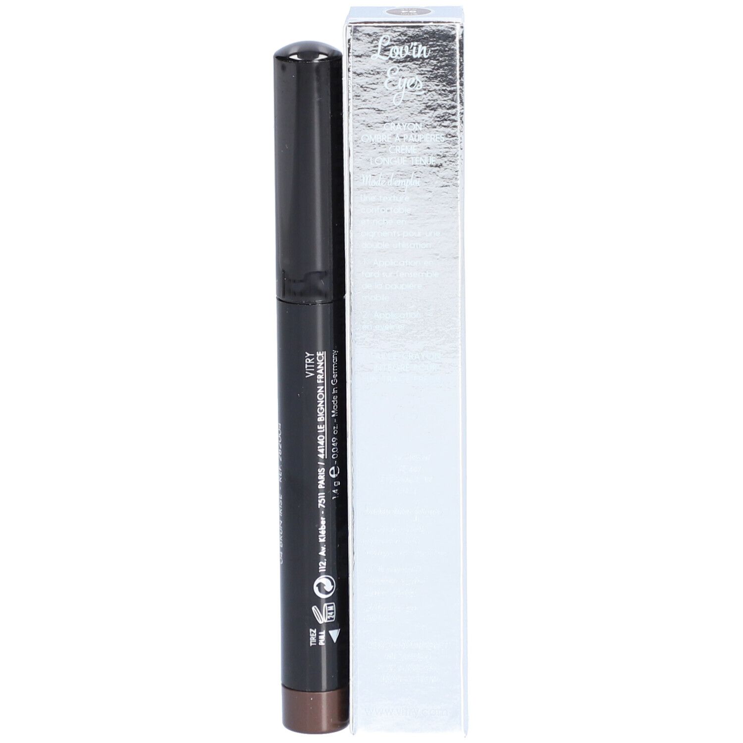 Crayon pour les yeux brun foncé et emballage argenté. Inscription : LONGCILS LOV'IN EYES. Détails sur l'emballage.