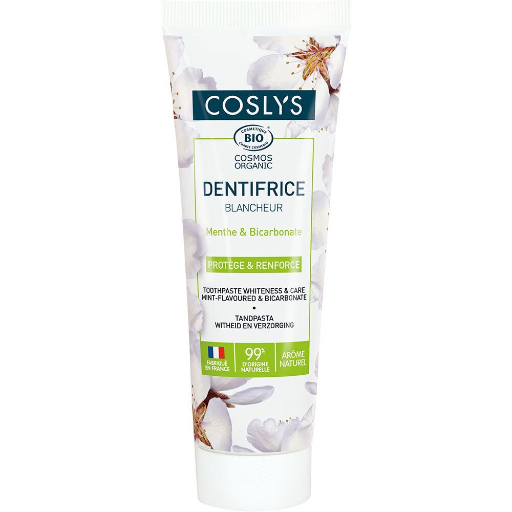 Tube de dentifrice Coslys, Menthe & Bicarbonate. Design floral, certification bio. Inscription: Dentifrice Blancheur. Drapeau français.