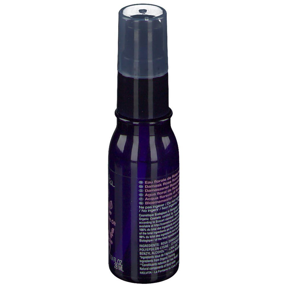 Vue arrière du flacon pulvérisateur bleu foncé. Texte multilingue. Ingrédients et informations.