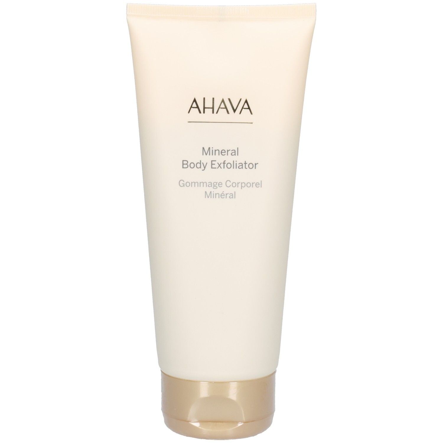 Tube beige avec bouchon doré. Inscription : AHAVA, Mineral Body Exfoliator, Gommage Corporel Minéral.
