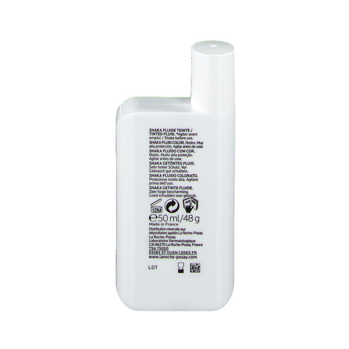 Dos du flacon blanc. Texte multilingue. Inscription: Shaka Fluide Teinté. Taille: 50 ml/48 g. Avec code QR.