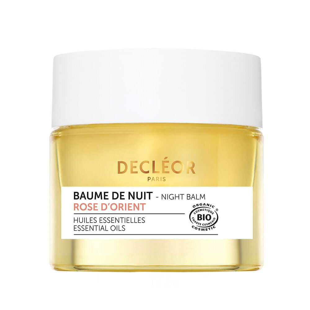 Pot de baume jaune et couvercle blanc. Inscription: Decléor Paris, Baume de Nuit, Rose d'Orient, label bio.