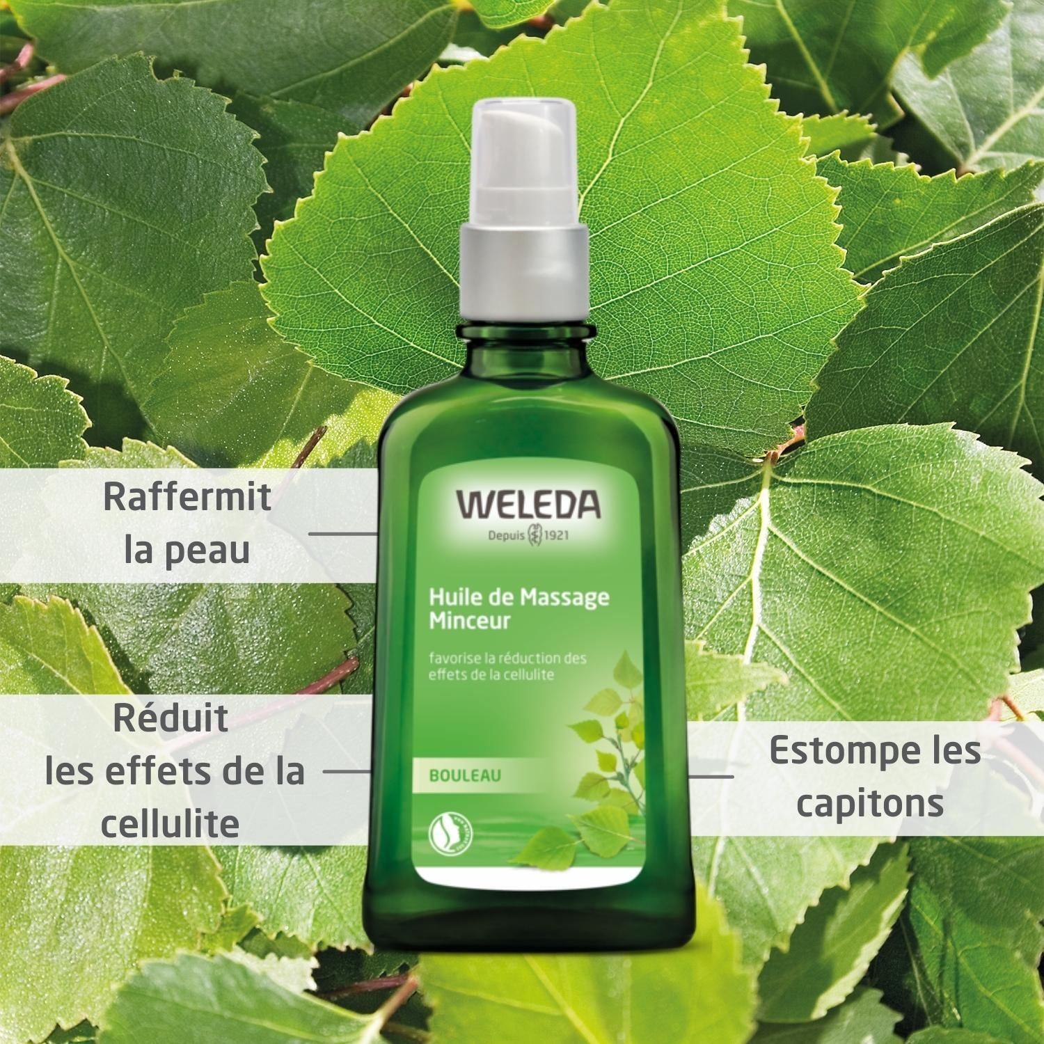 Flacon vert avec vaporisateur. Inscription: WELEDA, Huile de Massage Minceur, BOULEAU. Feuilles en arrière-plan.