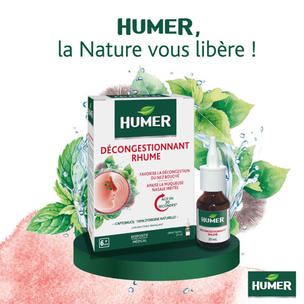 Emballage du produit et spray nasal sur une plateforme verte. Texte : "HUMER", "DÉCONGESTIONNANT RHUME", "SPRAY NASAL".