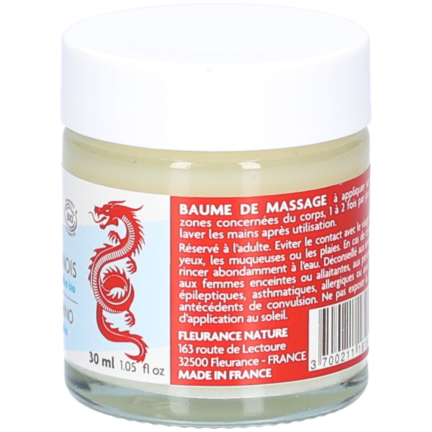 Pot en verre avec couvercle blanc. Inscription: Baume de Massage. Texte en français. Dragon rouge.