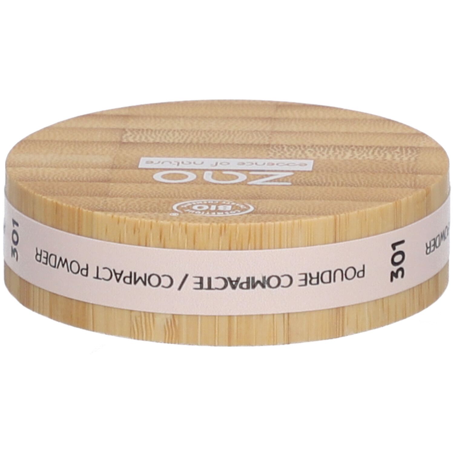 Boîtier de poudre compacte en bois. Inscriptions: ZAO, 301, Poudre Compacte/Compact Powder. Label bio.