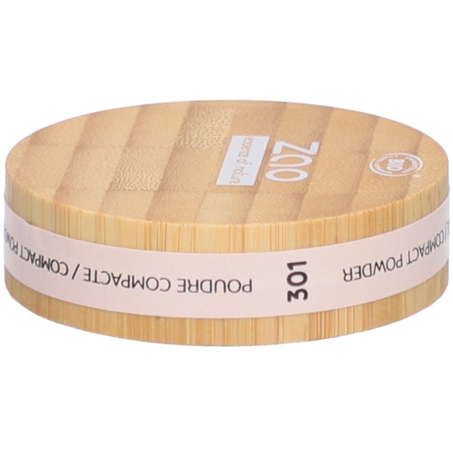 Boîtier de poudre compacte en bois. Inscriptions: ZAO, 301, Poudre Compacte/Compact Powder. Label bio.