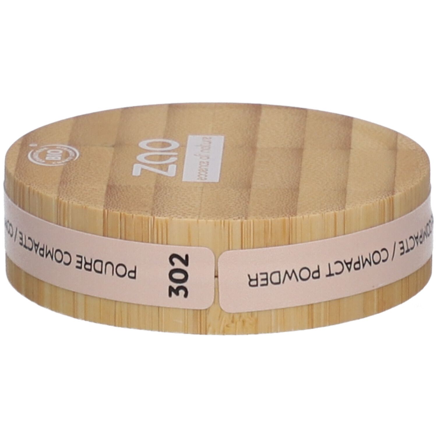 Boîtier rond de poudre compacte en bois. Inscriptions : ZAO, 302, POUDRE COMPACTE. Certification bio.