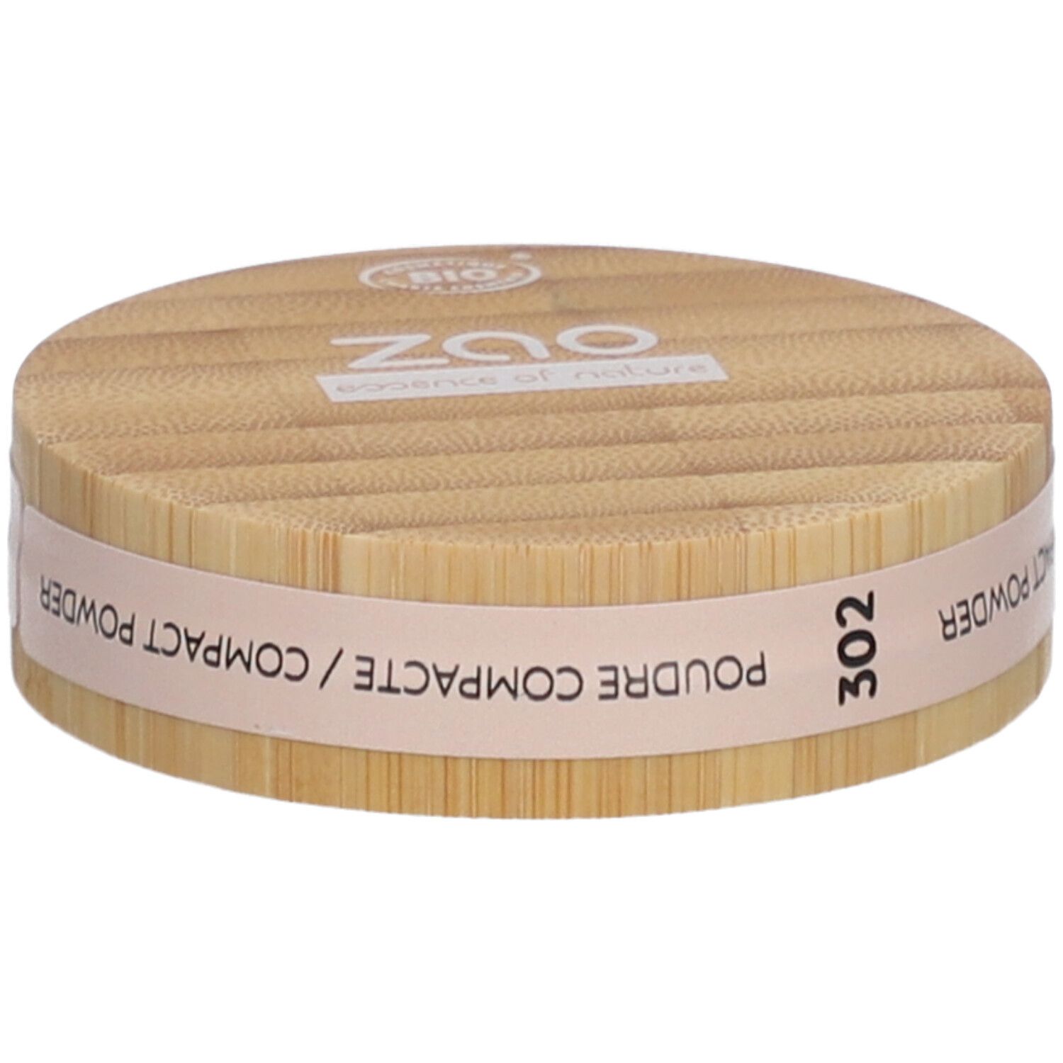 Boîtier rond de poudre compacte en bois. Inscriptions : ZAO, 302, POUDRE COMPACTE. Certification bio.