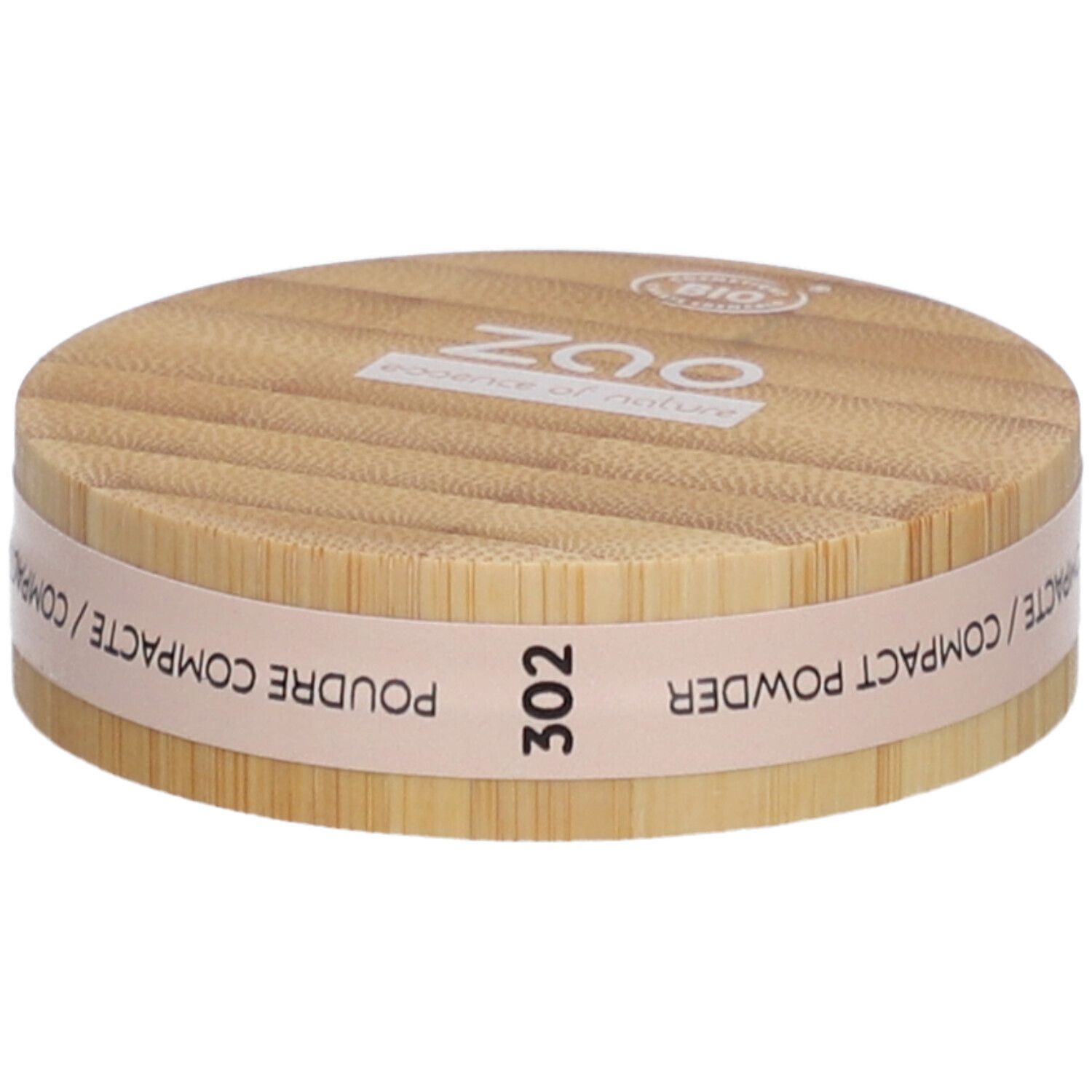 Boîtier rond de poudre compacte en bois. Inscriptions : ZAO, 302, POUDRE COMPACTE. Certification bio.