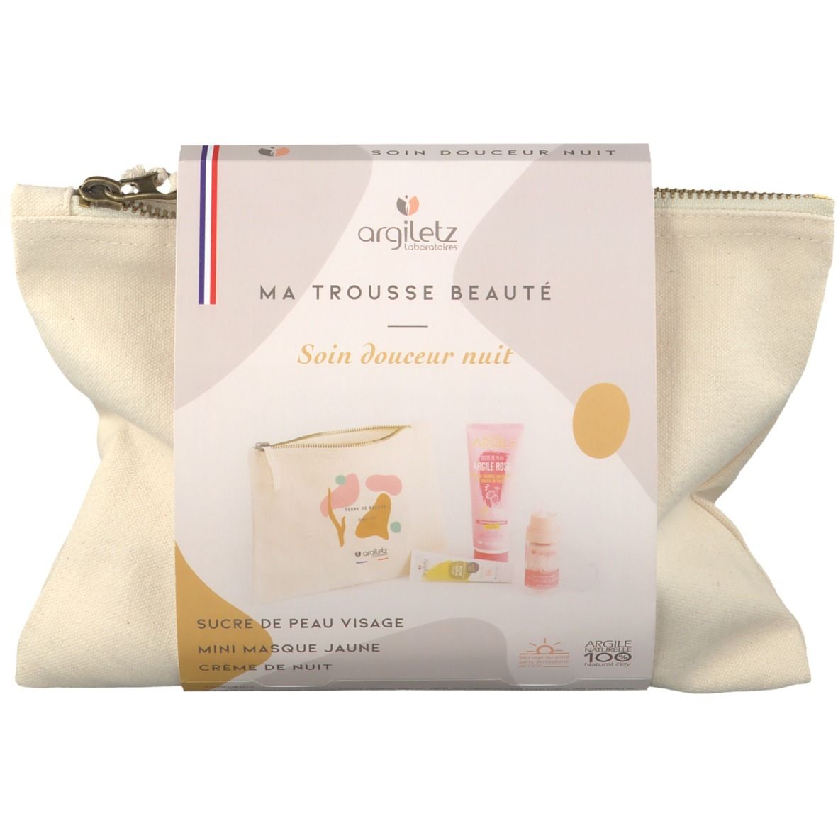 Trousse de toilette beige avec emballage Argiletz. Contient des produits de soin de nuit. Inscription : Ma Trousse Beauté.
