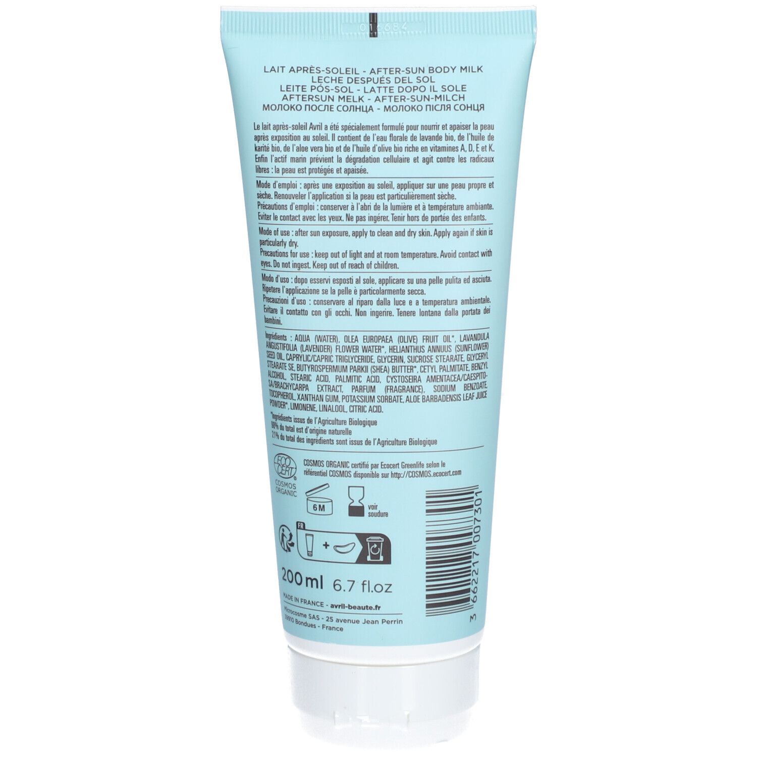 Dos du tube bleu clair. Texte multilingue. Ingrédients et certifications. Symboles imprimés et code-barres.