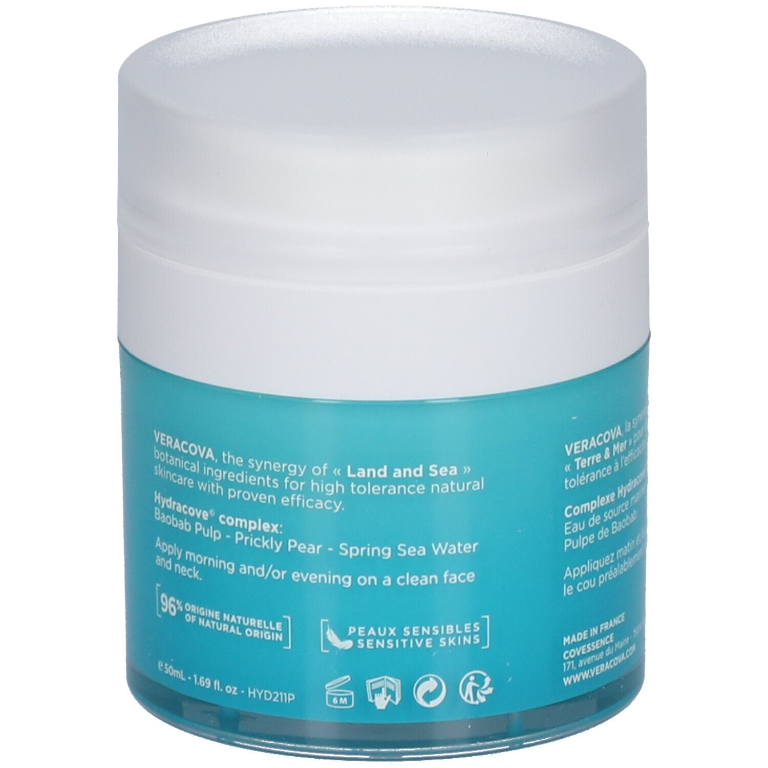 Dos d'un pot turquoise avec couvercle blanc. Informations textuelles et ingrédients. 96% d'origine naturelle.